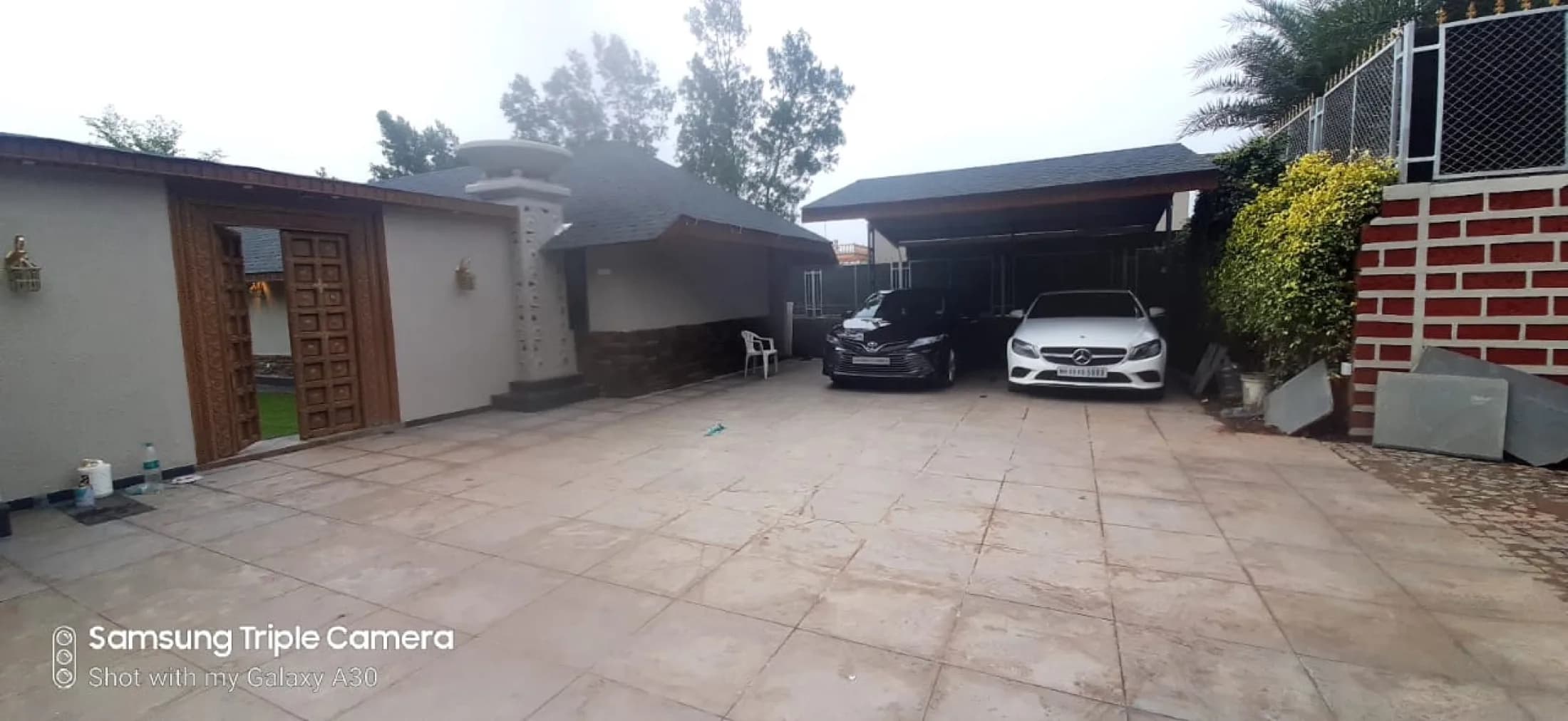 Dr. Sanjay D Patil Luxurious Farmhouse - Parking